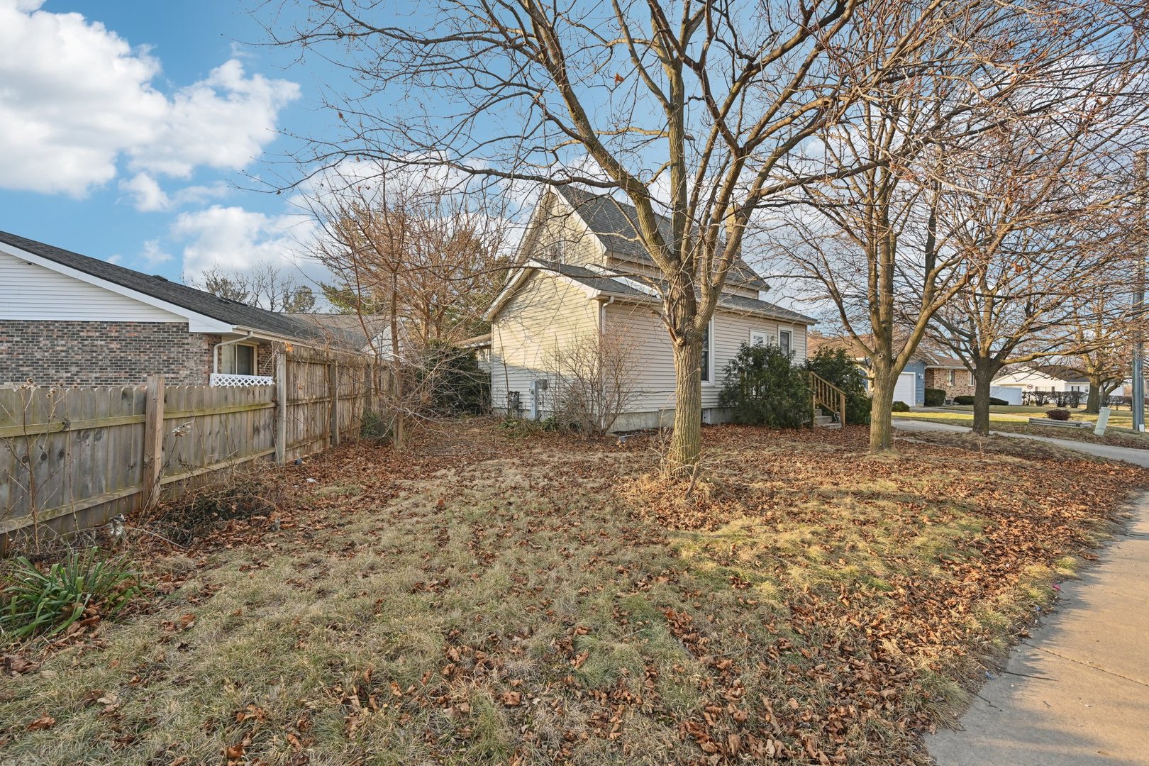 214 South Prospect Street Marengo, IL 60152 - Photo 37 of 37 a view of a yard with a large tree
