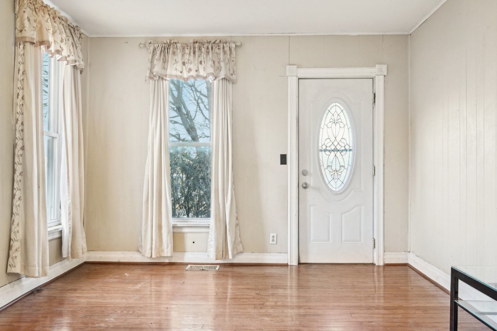 214 South Prospect Street Marengo, IL 60152 - Photo 6 of 37 a view of a room with wooden floor and window