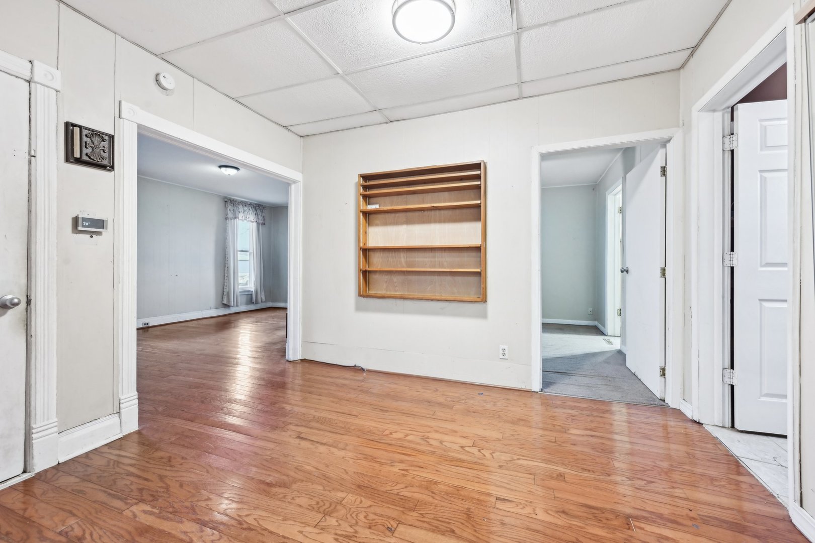 214 South Prospect Street Marengo, IL 60152 - Photo 8 of 37 a view of a hallway with wooden floor and closet