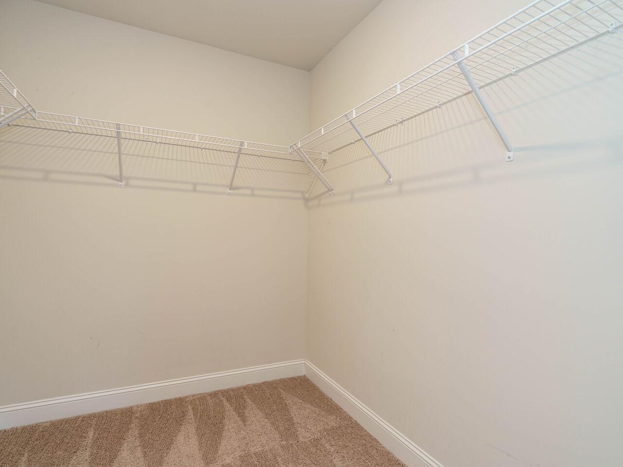 6914 Eddy Point Lane Raleigh, NC 27616 - Photo 20 of 33 a view of a rack on the wall