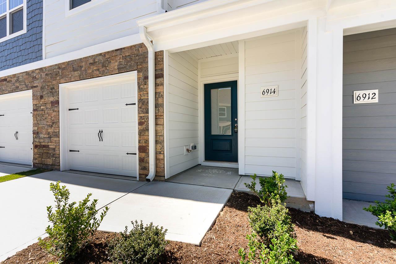 6914 Eddy Point Lane Raleigh, NC 27616 - Photo 4 of 33 a view of a house with potted plants