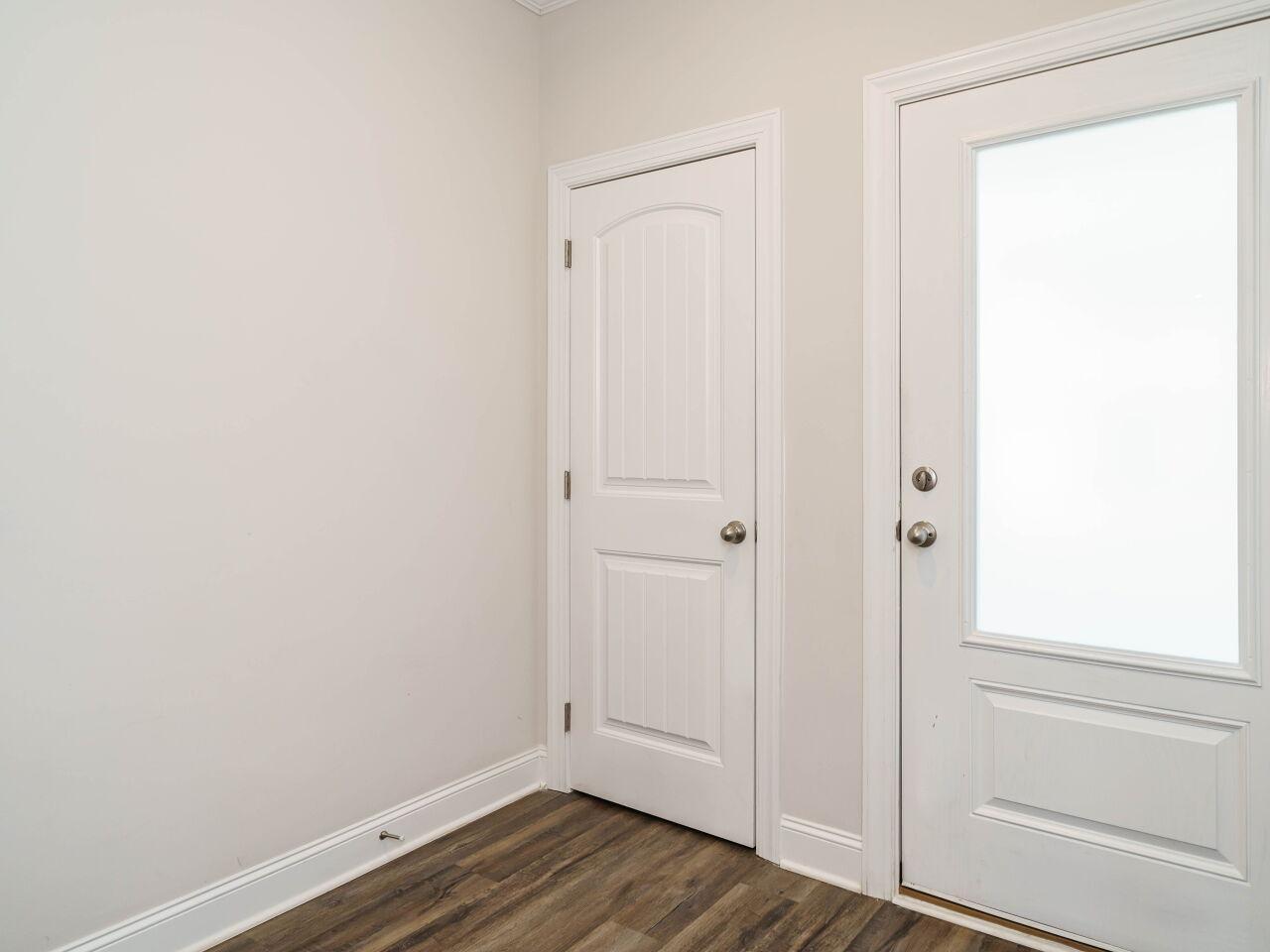 6914 Eddy Point Lane Raleigh, NC 27616 - Photo 5 of 33 a view of small space with wooden floor
