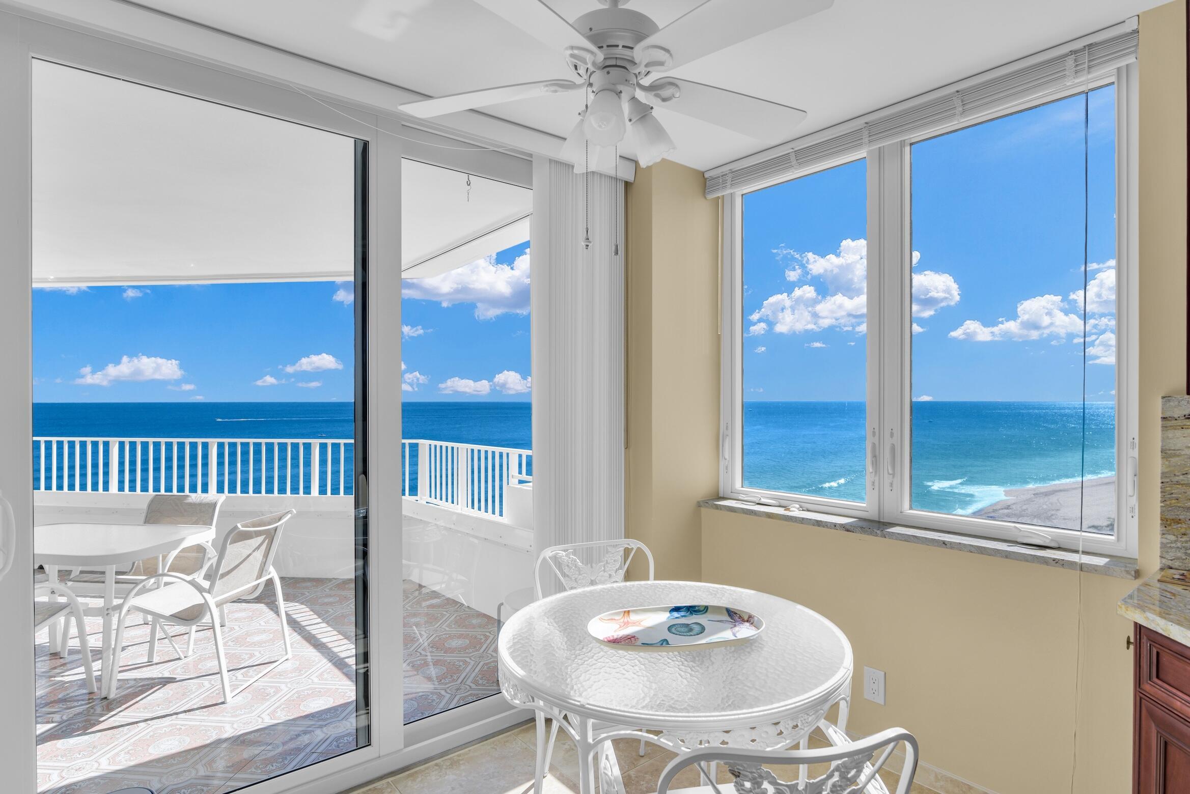 500 South Ocean Boulevard, Unit 1006 Boca Raton, FL 33432 - Photo 13 of 40 a view of a dining room with furniture wooden floor and chandelier