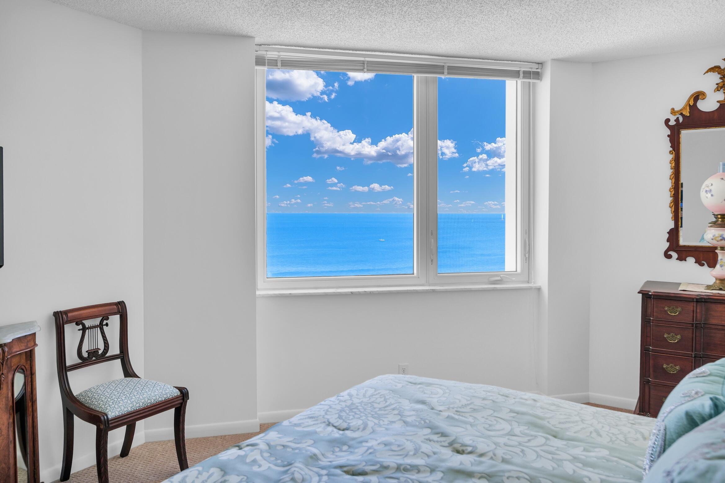 500 South Ocean Boulevard, Unit 1006 Boca Raton, FL 33432 - Photo 16 of 40 a bedroom with a bed and a window