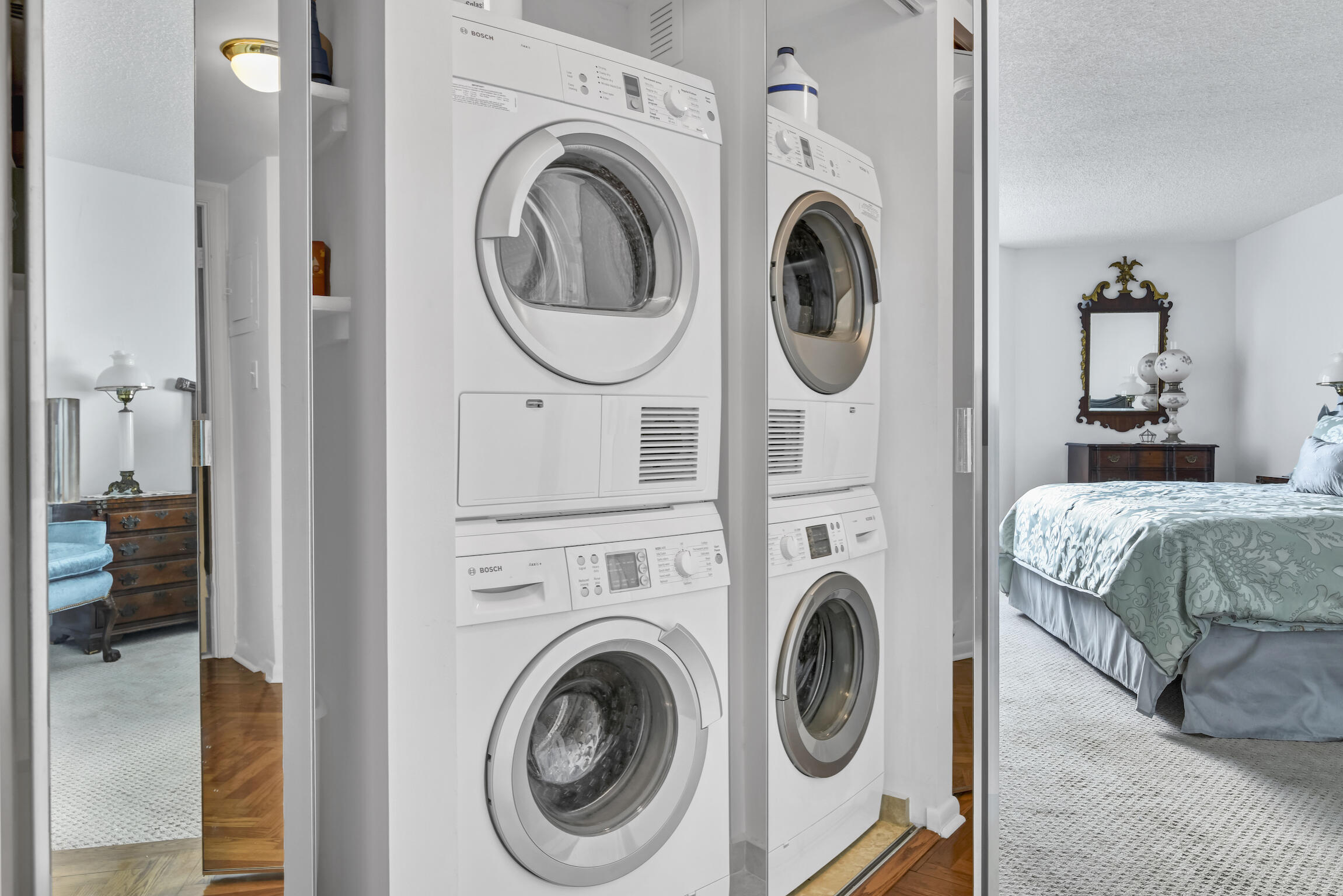 500 South Ocean Boulevard, Unit 1006 Boca Raton, FL 33432 - Photo 23 of 40 a view of a bedroom with washer and dryer