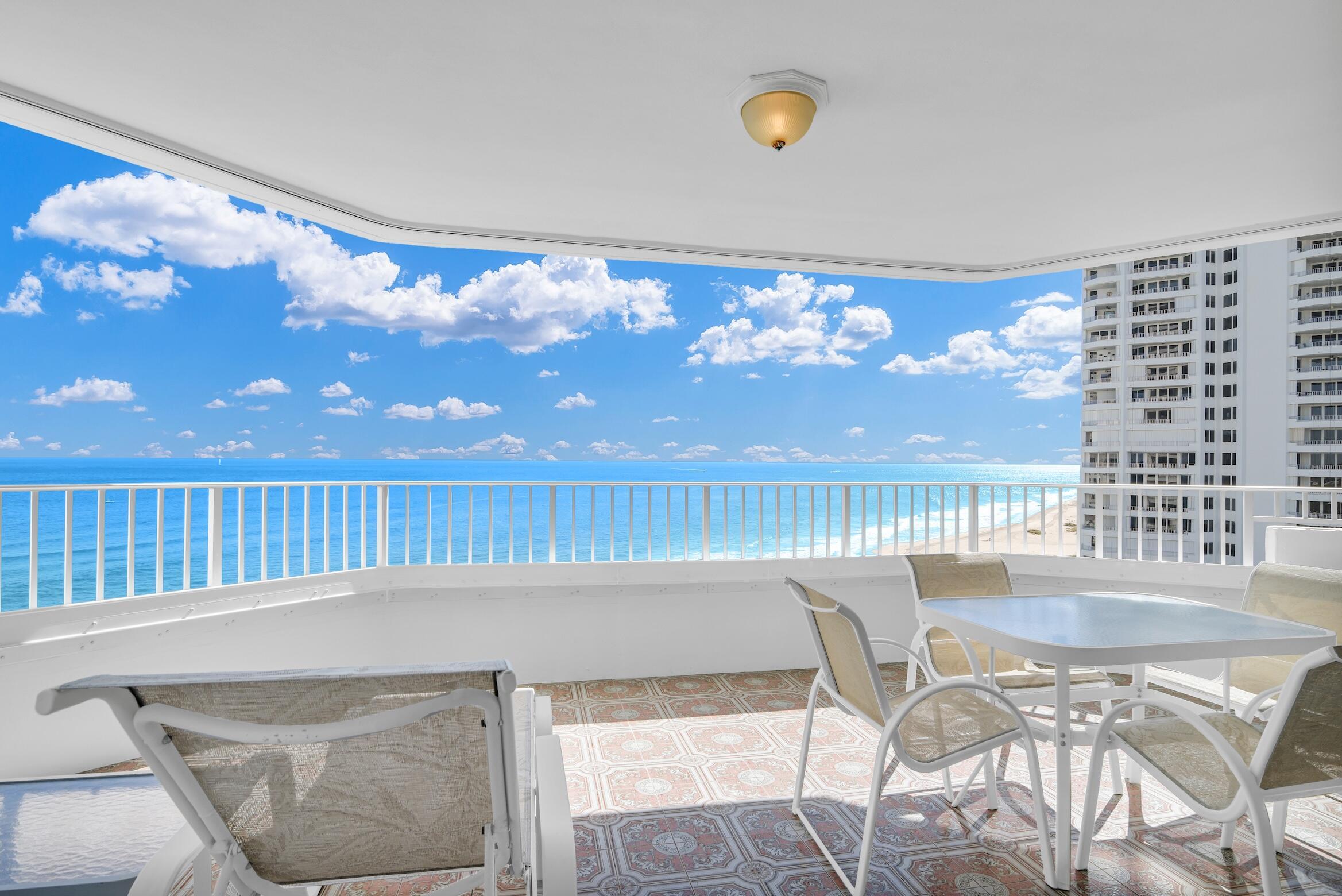 500 South Ocean Boulevard, Unit 1006 Boca Raton, FL 33432 - Photo 8 of 40 a view of a dining room with furniture and chandelier