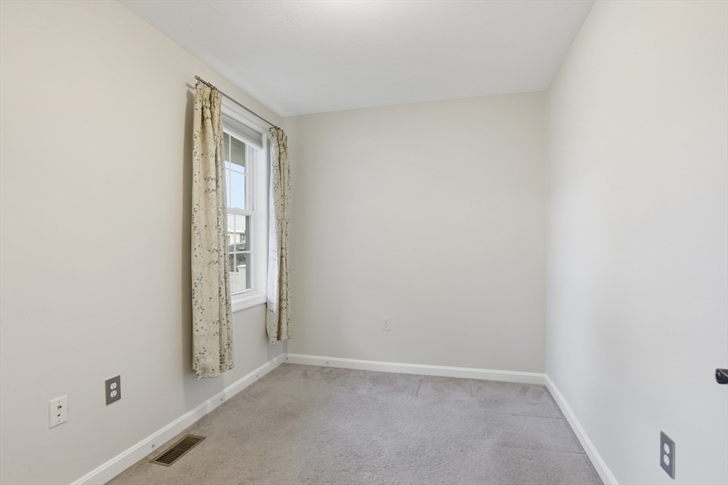 9 Montgomery Avenue, Unit 1 Somerville, MA 02145 - Photo 18 of 27 a view of an empty room