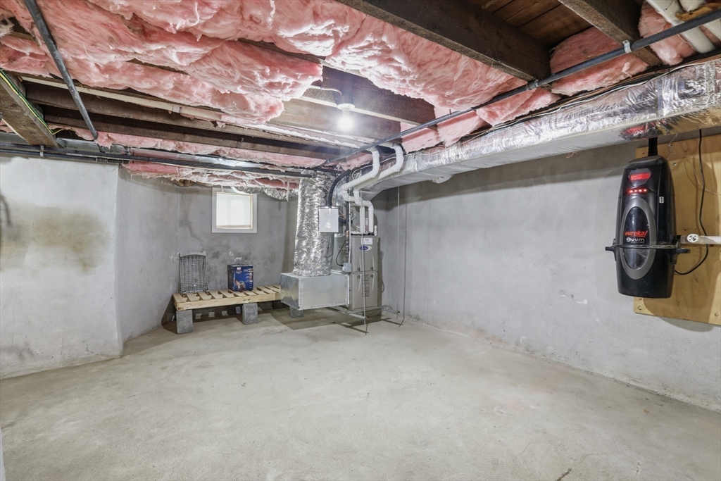 9 Montgomery Avenue, Unit 1 Somerville, MA 02145 - Photo 23 of 27 a view of empty room with wooden ceiling