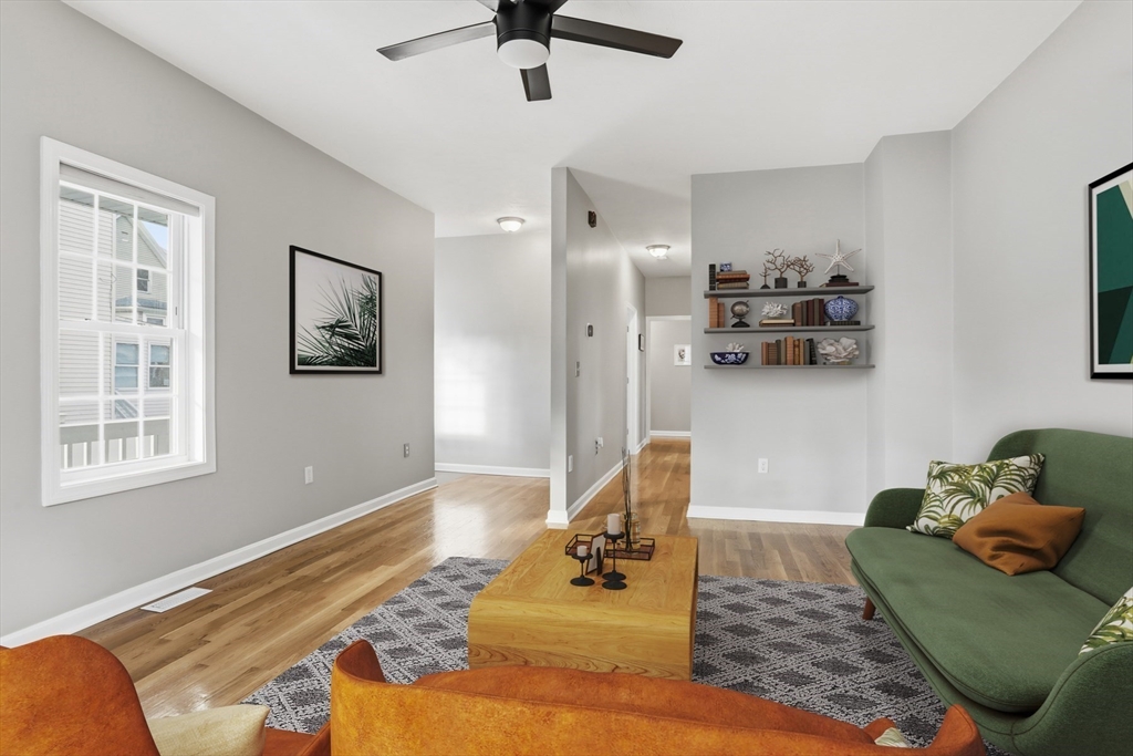 9 Montgomery Avenue, Unit 1 Somerville, MA 02145 - Photo 5 of 27 a living room with furniture