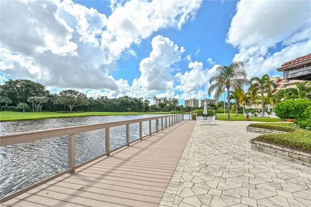 a view of swimming pool from a lounge chair