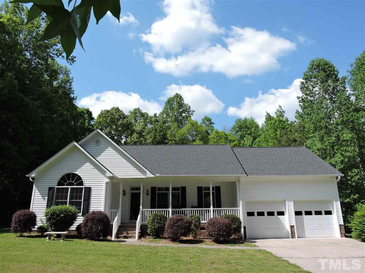 3360 Cates Mill Road Roxboro, NC 27574 - Photo 1 of 17 a view of a house with garden and yard