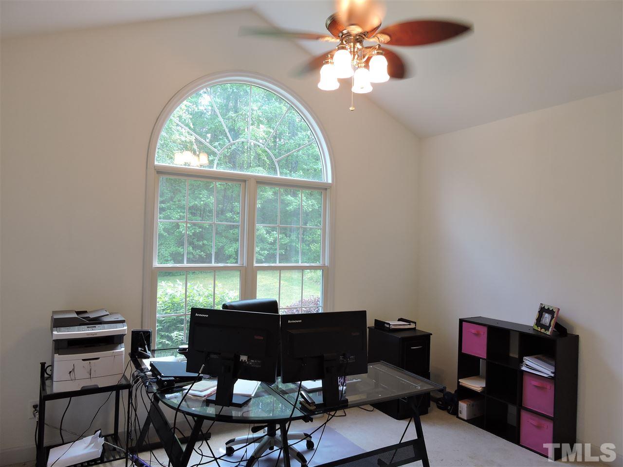 3360 Cates Mill Road Roxboro, NC 27574 - Photo 11 of 17 a view of a workspace with furniture and a window