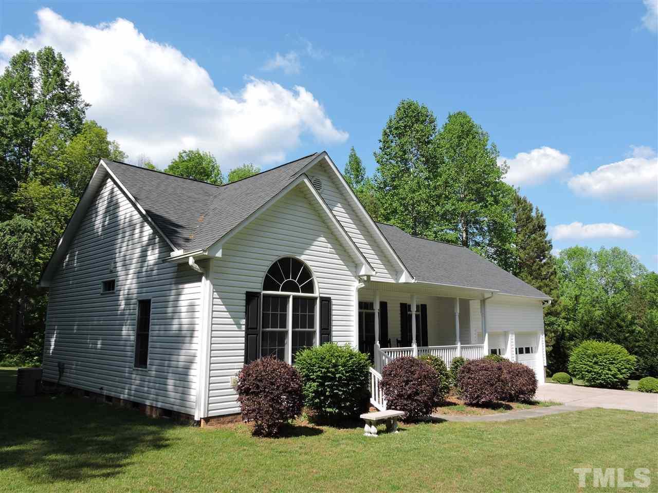 3360 Cates Mill Road Roxboro, NC 27574 - Photo 14 of 17 a front view of house with yard and green space