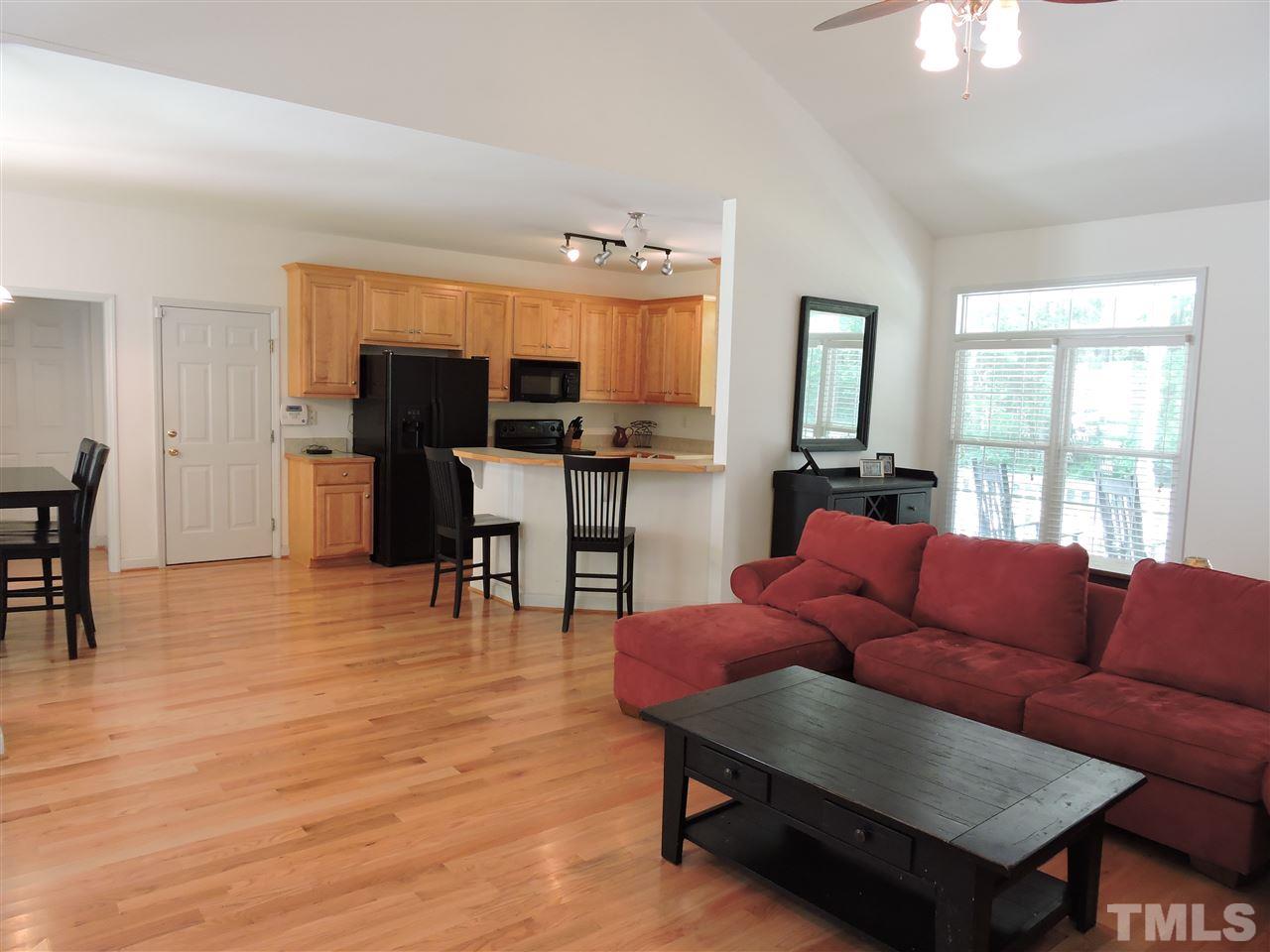 3360 Cates Mill Road Roxboro, NC 27574 - Photo 3 of 17 a living room with furniture and a wooden floor