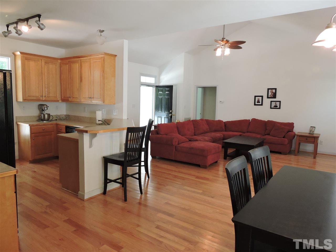 3360 Cates Mill Road Roxboro, NC 27574 - Photo 4 of 17 a living room with furniture and a wooden floor