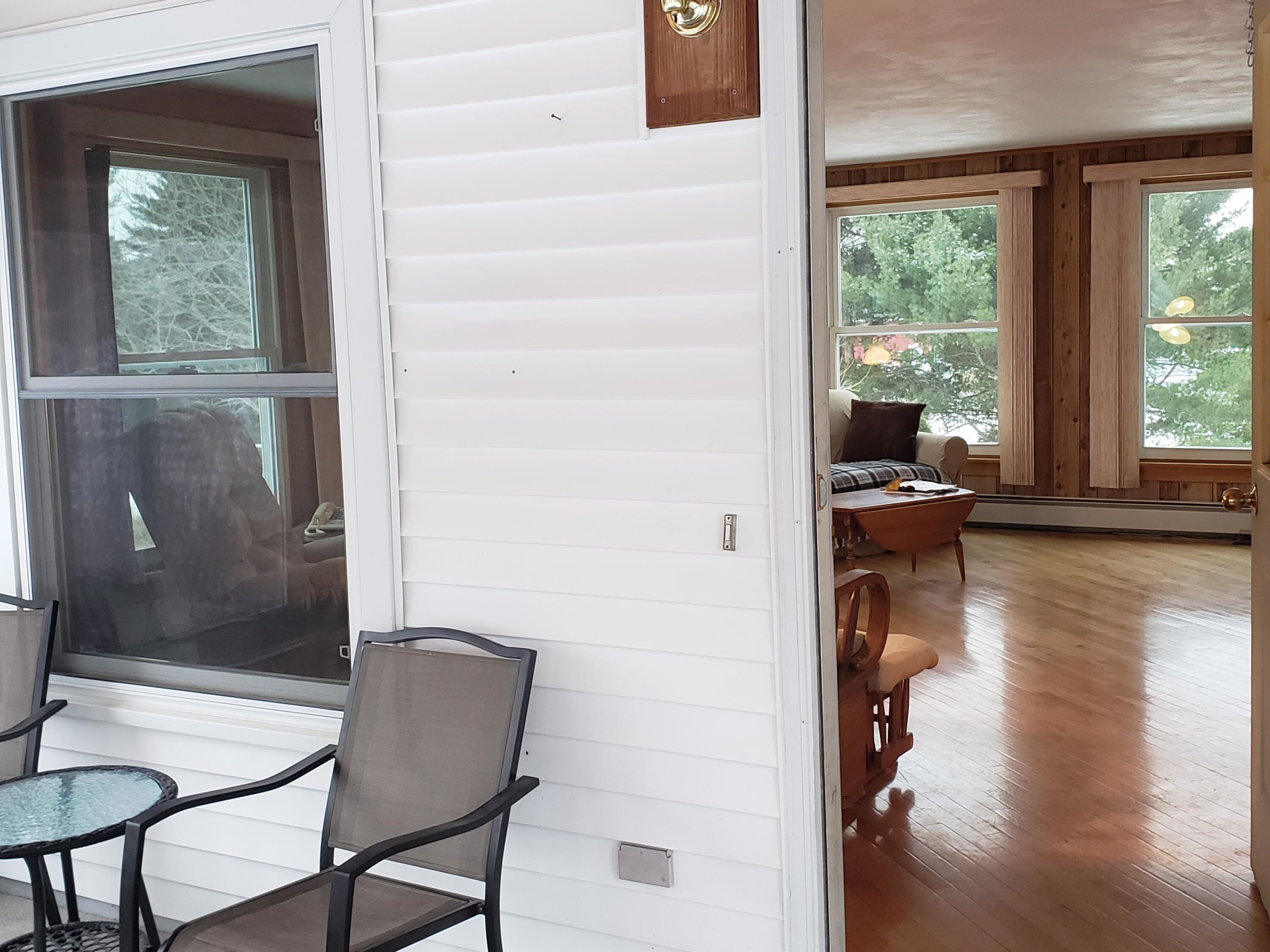 29 Duck Cove Road Orland, ME 04472 - Photo 22 of 60 Enclosed porch to living room