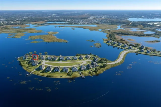 a view of an ocean and a building in the background