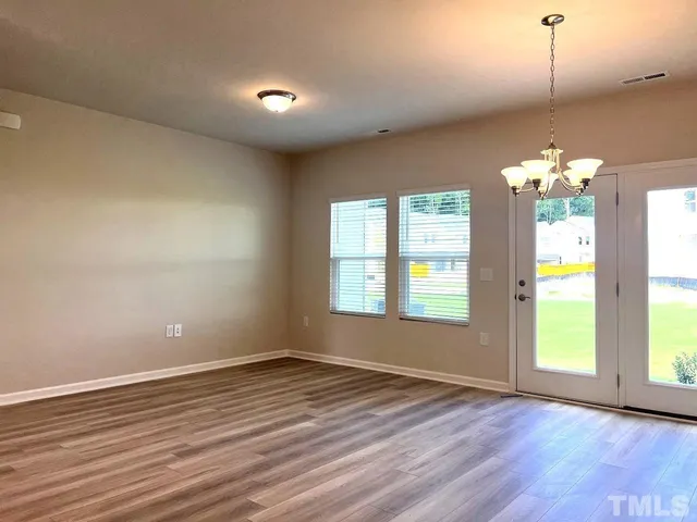 a view of livingroom with hardwood floor and window