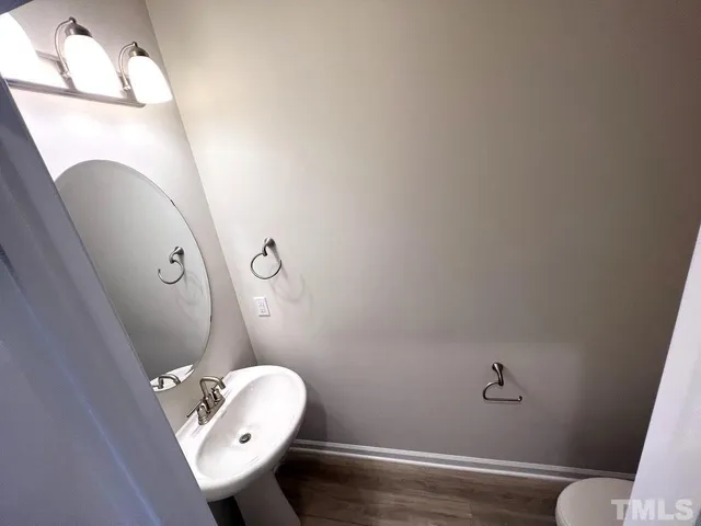a bathroom with a toilet and a sink
