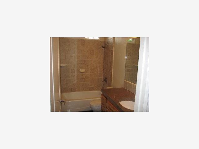 720 Lewis Road Watsonville, CA 95076 - Photo 5 of 9 a bathroom with a sink and a shower