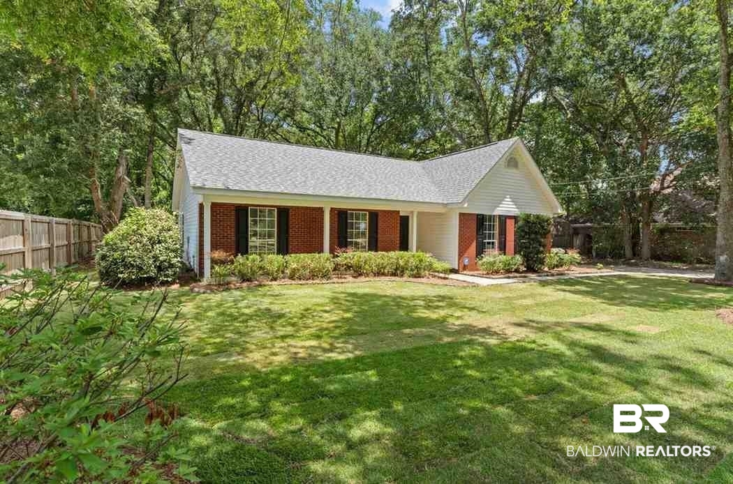 10251 Windmill Road Fairhope, AL 36532 - Photo 4 of 44 Ranch-style house featuring brick siding and roof with shingles
