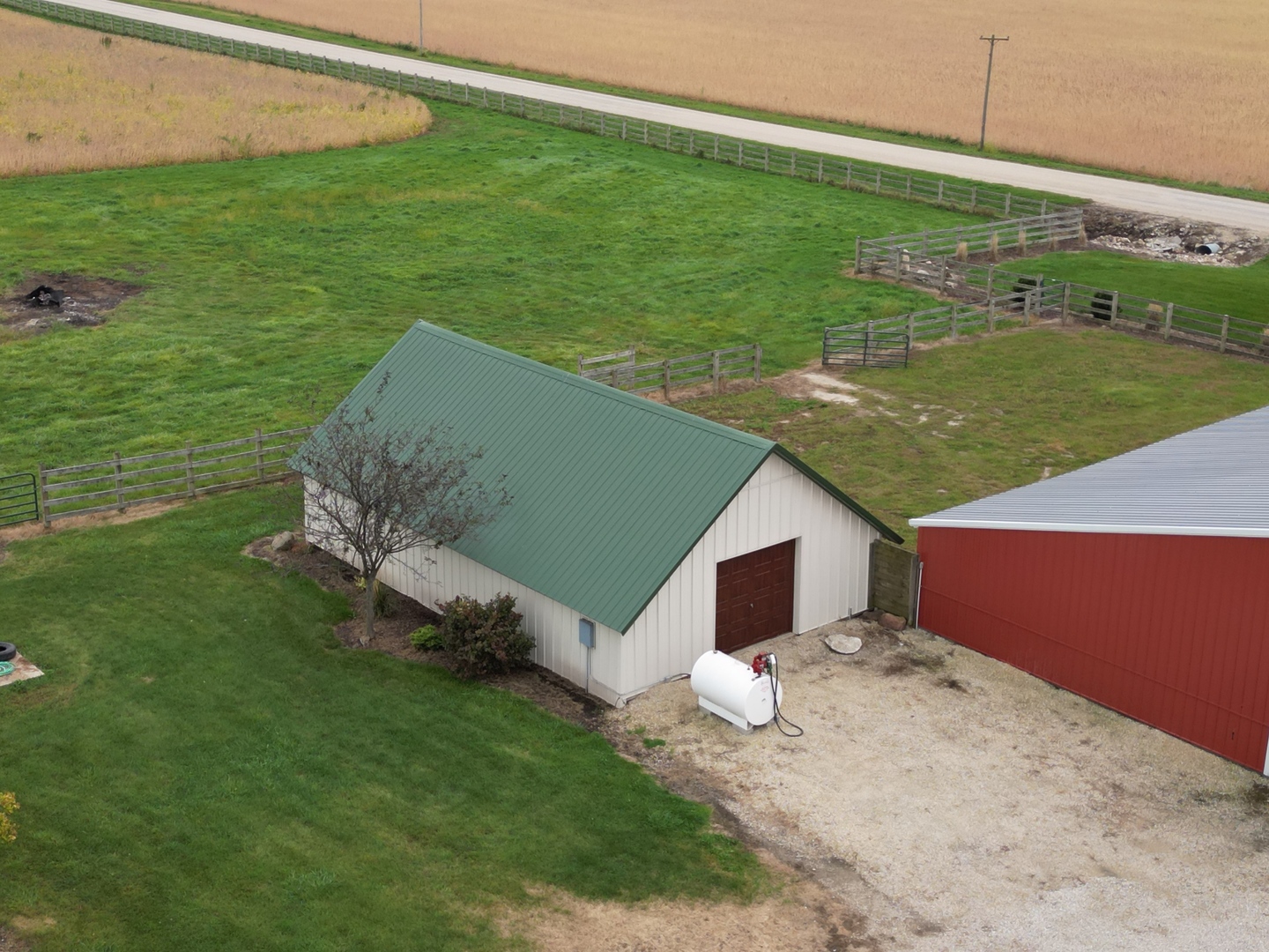 159 Twombly Road Malta, IL 60150 - Photo 12 of 31 a backyard of a house with lots of green space