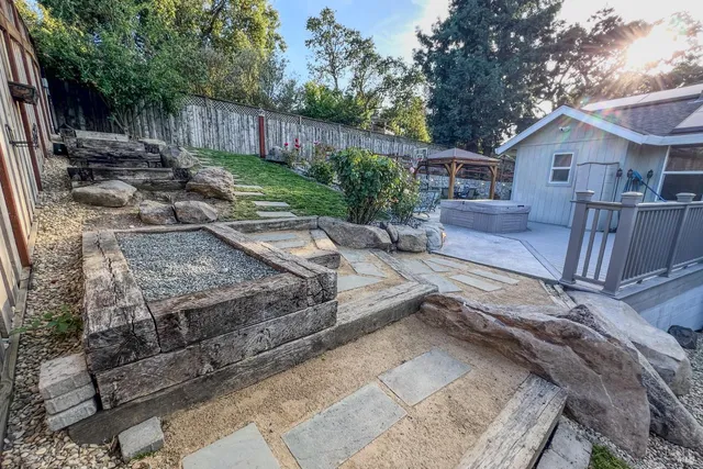 a front view of a house with garden
