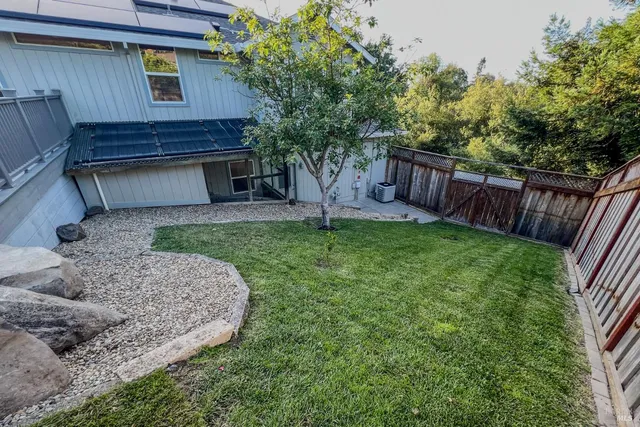 a view of a backyard with a garden