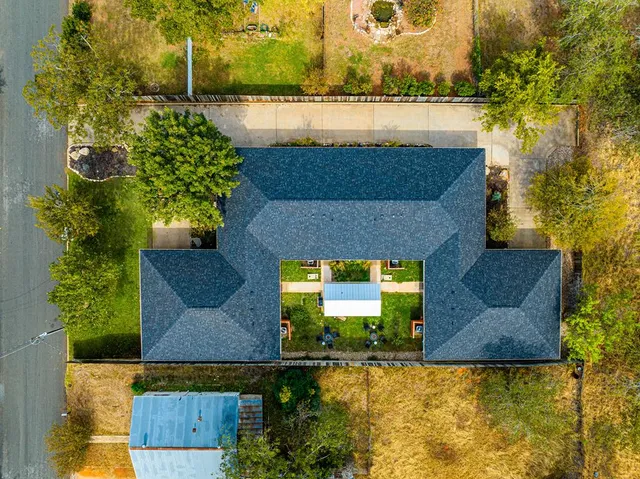 a sign that is sitting on a wooden floor