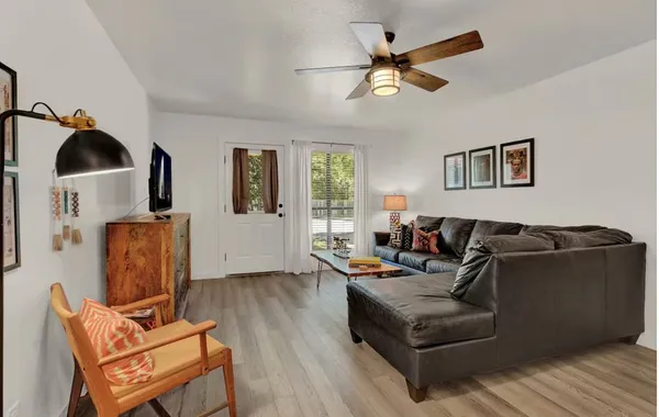 a kitchen with stainless steel appliances granite countertop a sink and cabinets