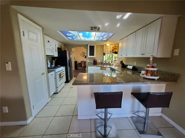 a bathroom with a glass door shower