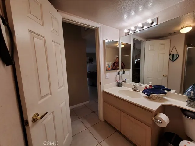 a bathroom with a toilet and a sink