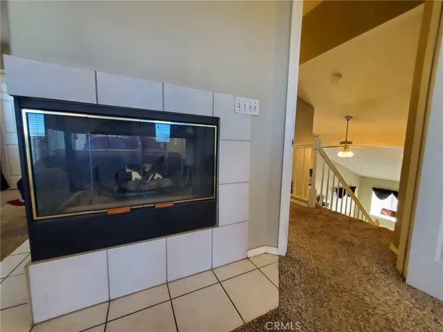 a view of a patio with table and chairs with wooden floor