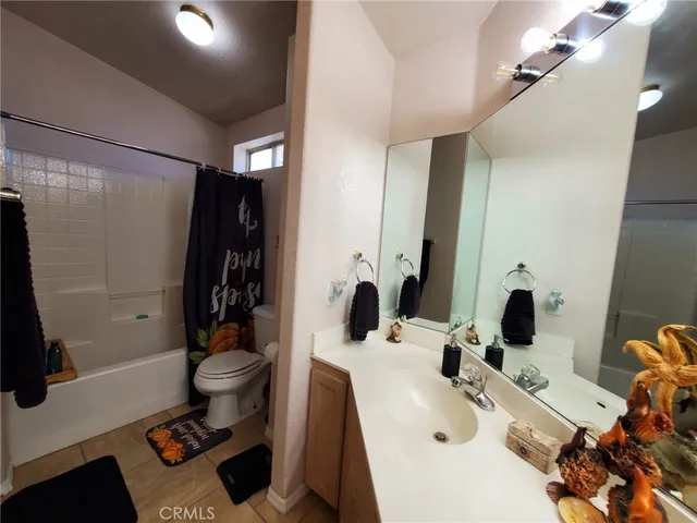 a view of a chairs and tables in the patio