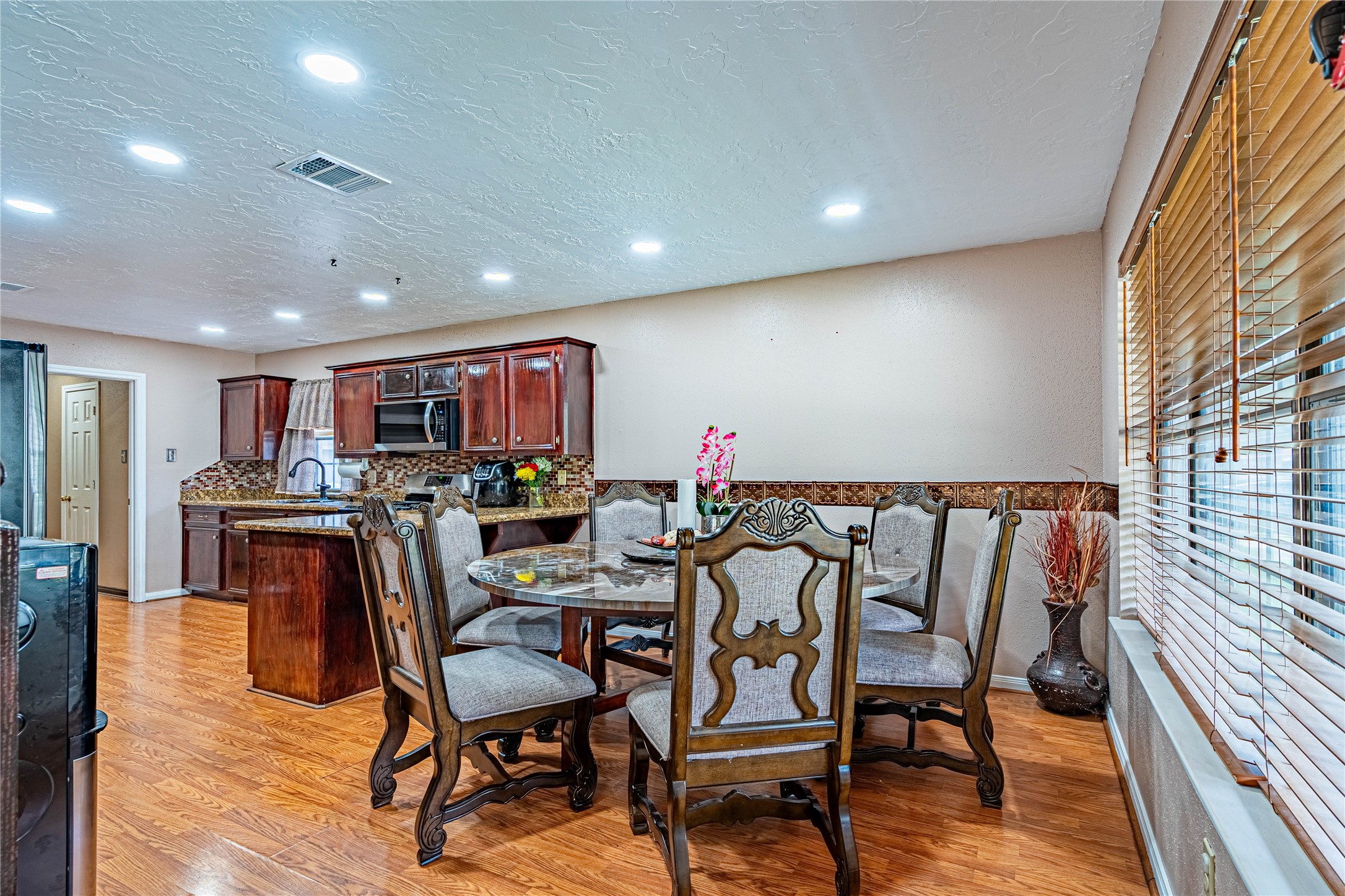3403 Berry Grove Drive Spring, TX 77388 - Photo 12 of 43 a view of a dining room with furniture