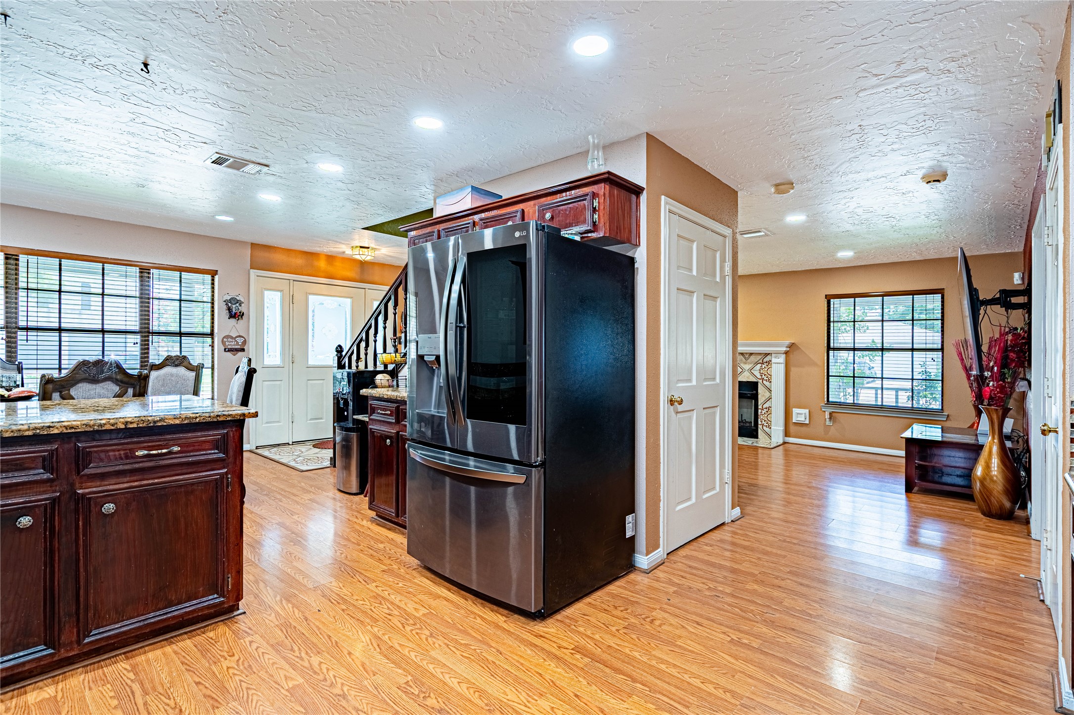 3403 Berry Grove Drive Spring, TX 77388 - Photo 17 of 43 a kitchen with stainless steel appliances granite countertop a refrigerator and a sink
