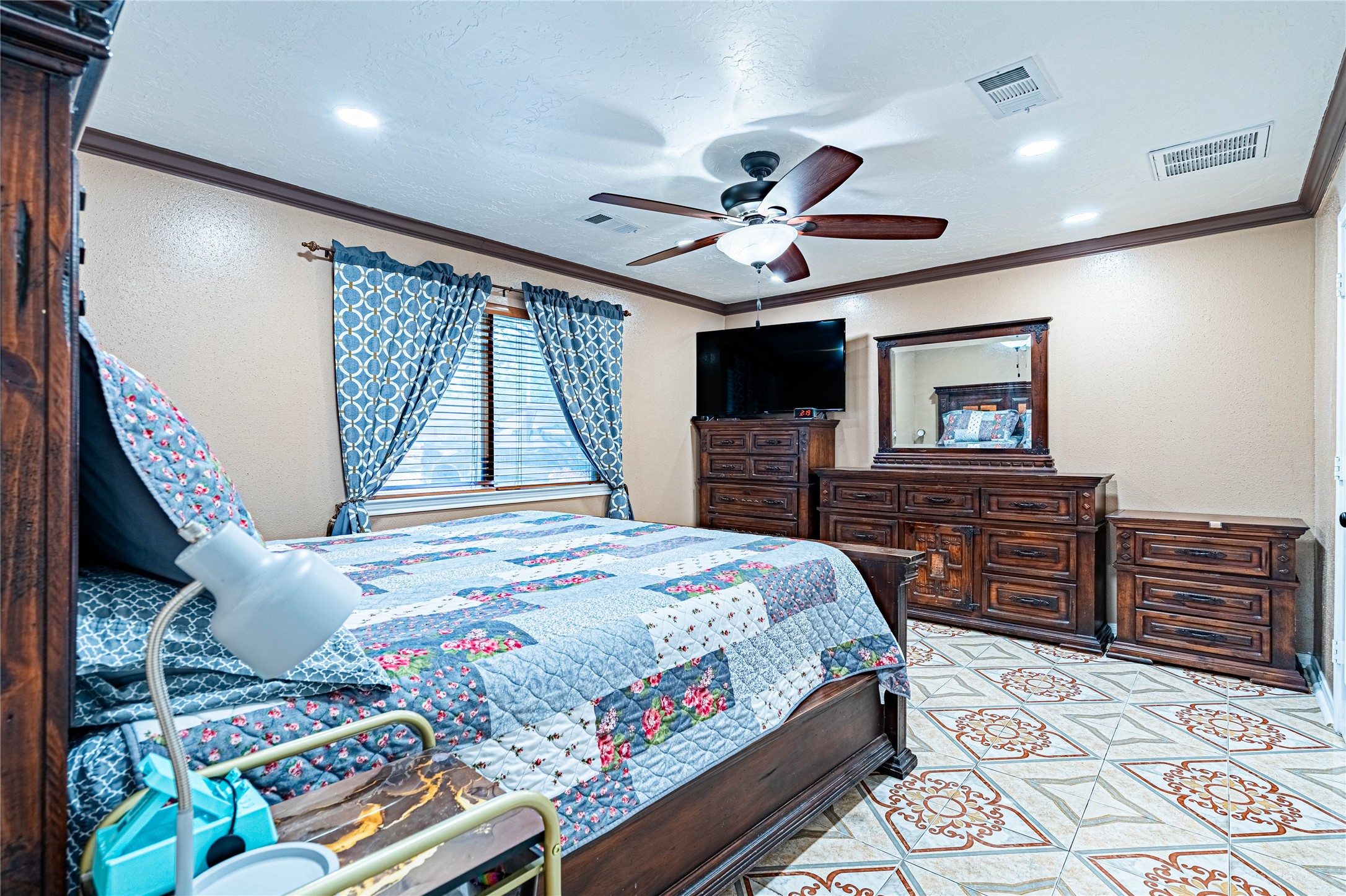 3403 Berry Grove Drive Spring, TX 77388 - Photo 21 of 43 a bedroom with a bed and wooden floor