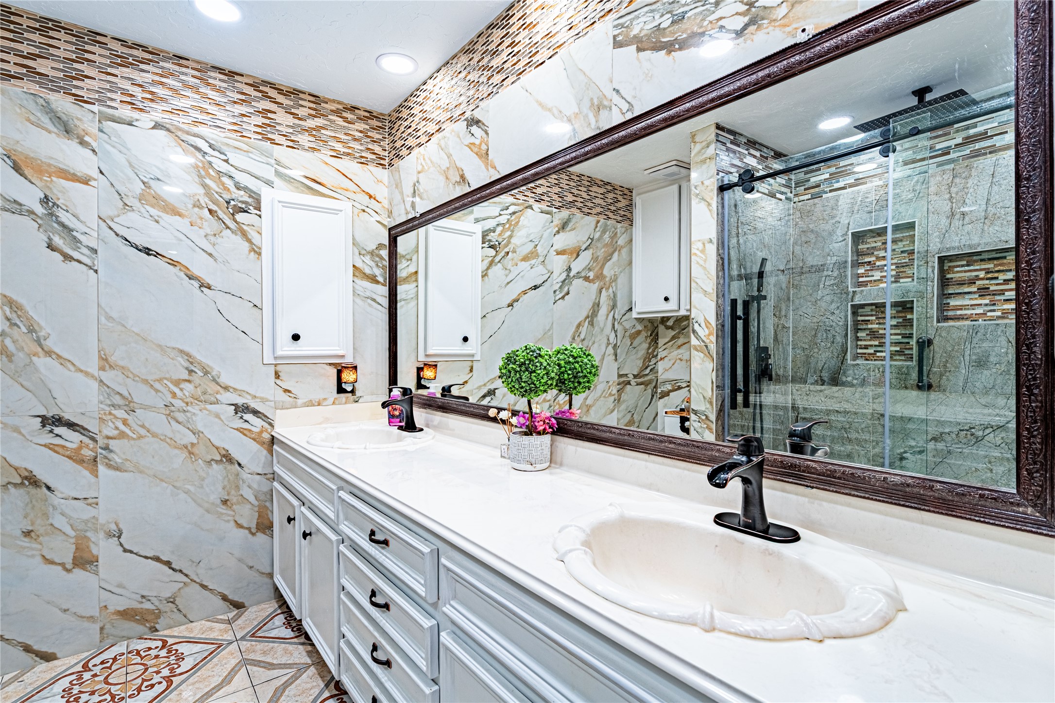 3403 Berry Grove Drive Spring, TX 77388 - Photo 22 of 43 a bathroom with double vanity and a shower