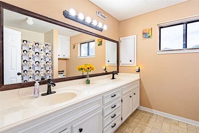 a bathroom with a sink double vanity