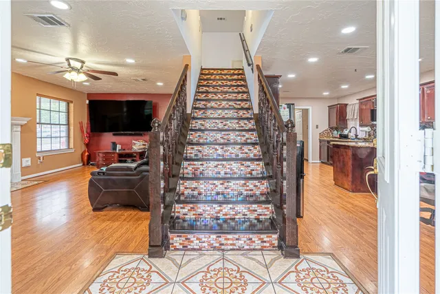 a view of a living room and dining room