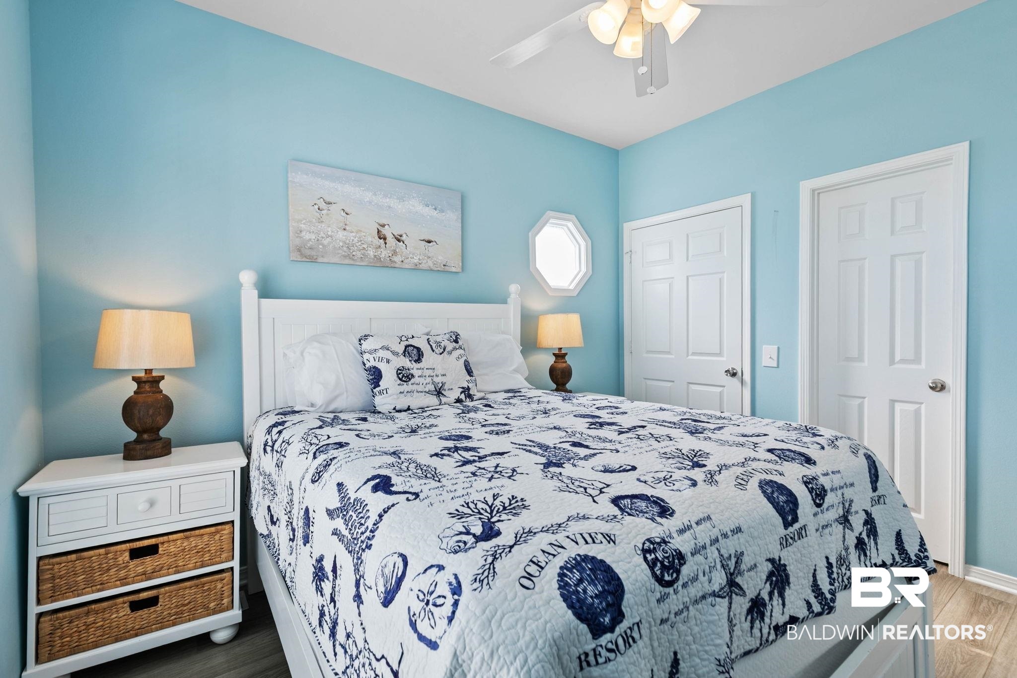 545 Plantation Road, Unit 3 Gulf Shores, AL 36542 - Photo 21 of 54 Bedroom with wood finished floors and a ceiling fan