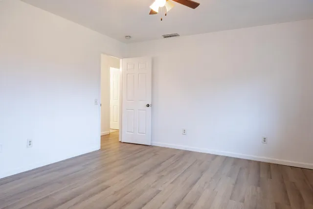 a view of an empty walk in closet