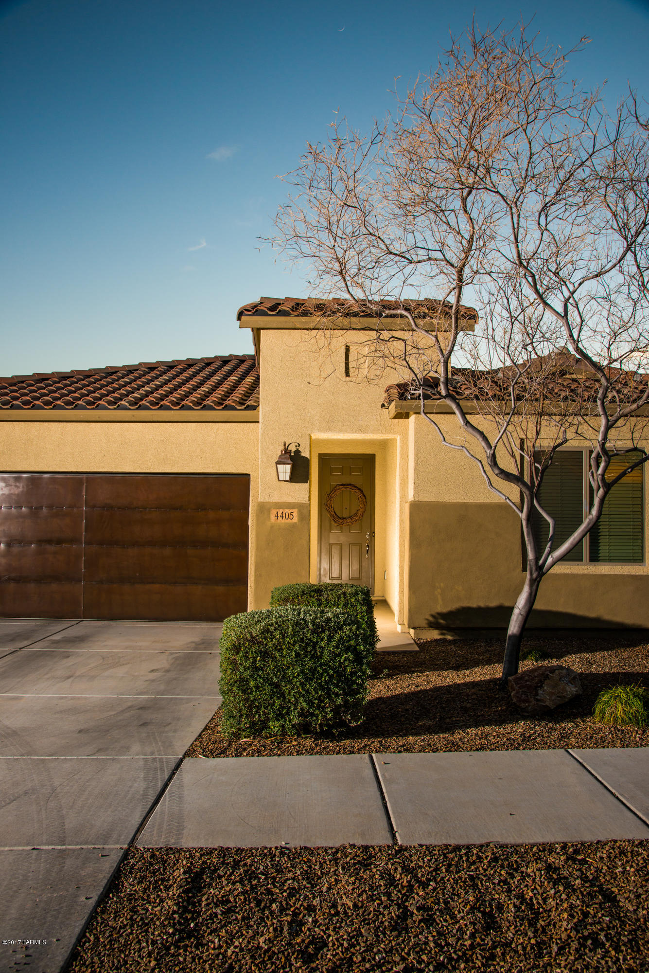 4405 West Crystal Ranch Place Marana, AZ 85658 - Photo 35 of 44 a view of a house with a small yard