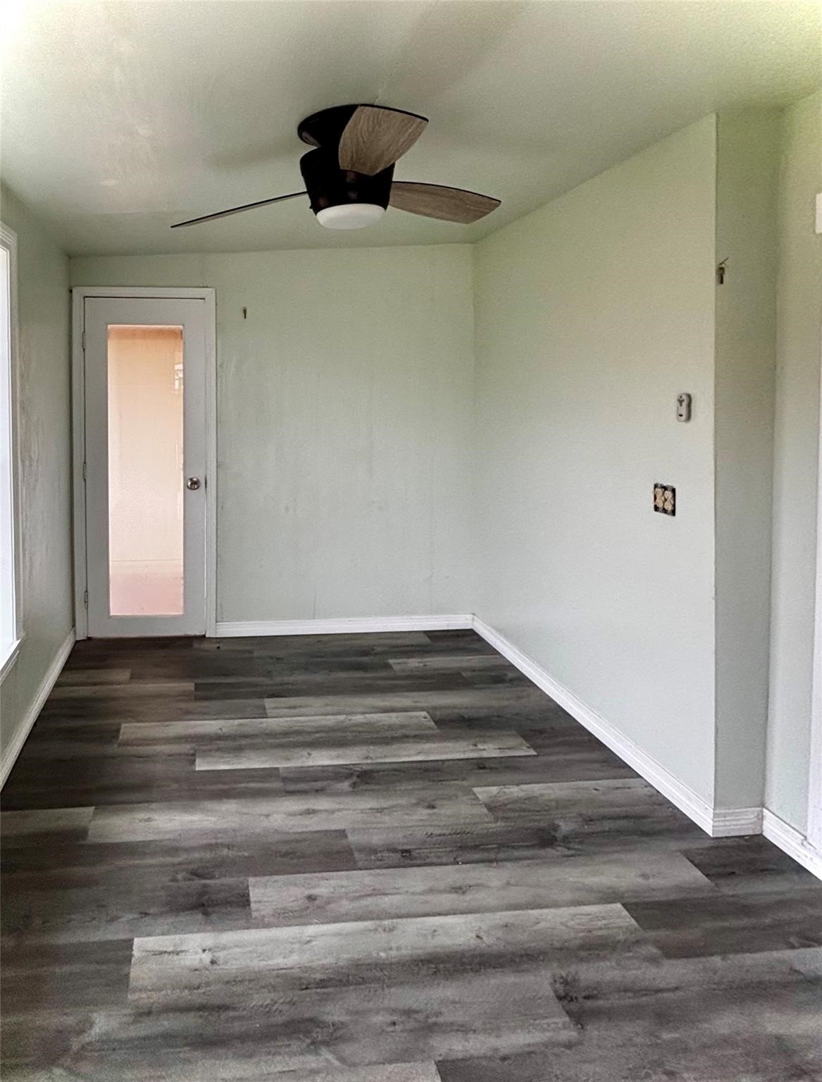 401 North 11th Street West Columbia, TX 77486 - Photo 13 of 15 a view of wooden floor