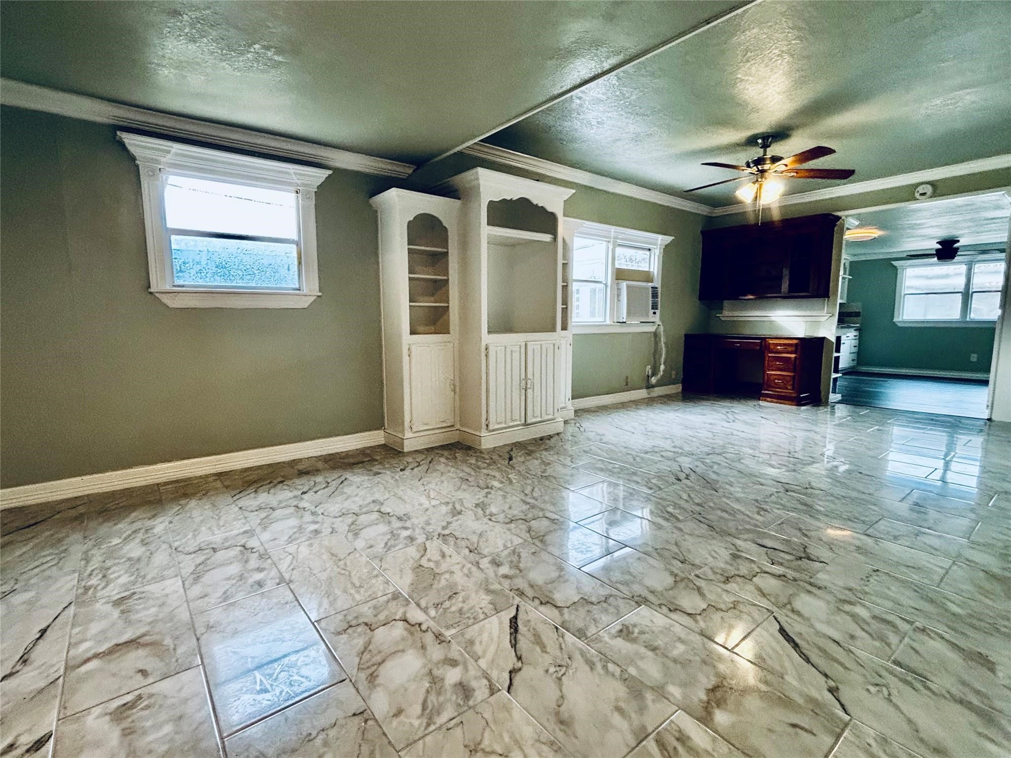 401 North 11th Street West Columbia, TX 77486 - Photo 15 of 15 a big room with chandelier and windows