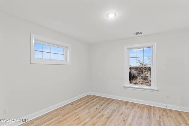 an empty room with window