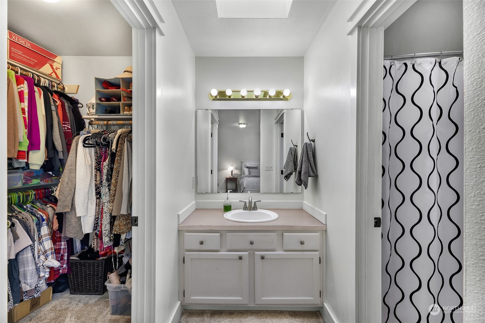 705 West Buena Road Lynden, WA 98264 - Photo 23 of 34 a view of a bathroom with a sink and a mirror