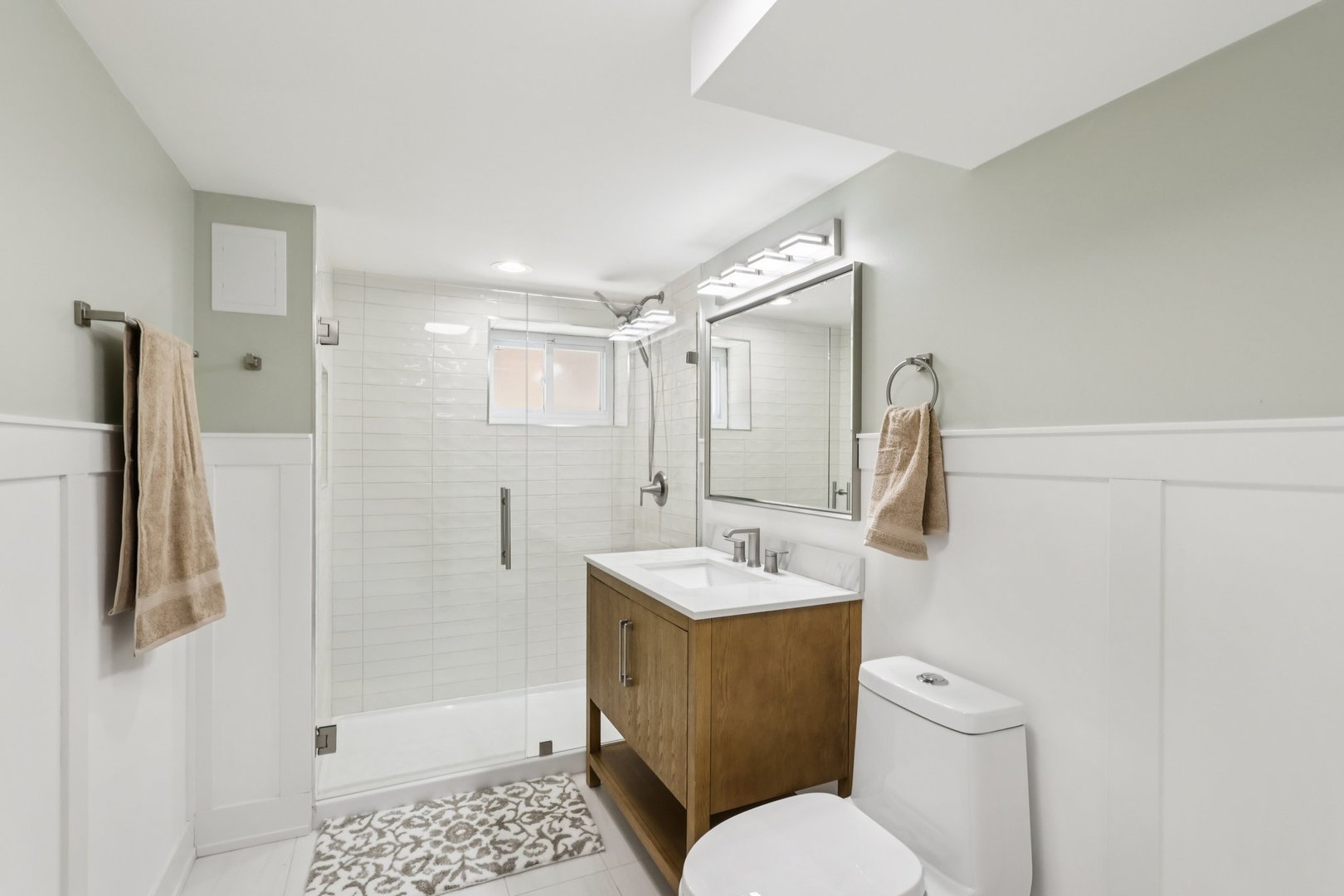 6014 West Fletcher Street Chicago, IL 60634 - Photo 23 of 33 a bathroom with a sink toilet and shower