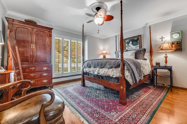 a living room with furniture a rug and a window