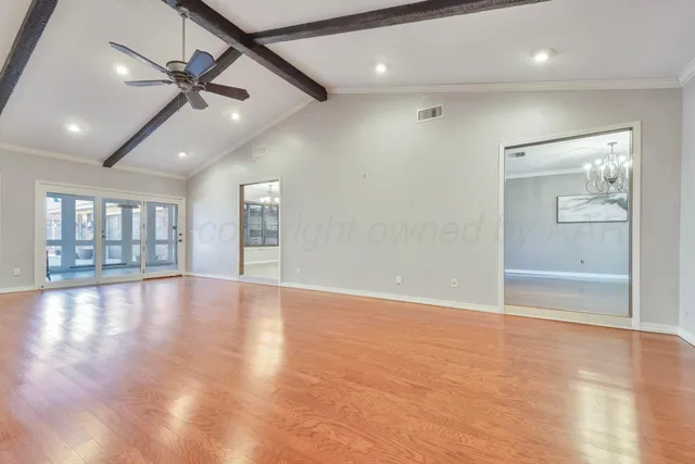a view of cabinets with wooden floor